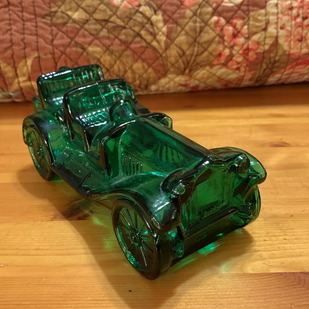 FREE WITH PURCHASE 
Vintage Avon green glass car automobile, cologne bottle